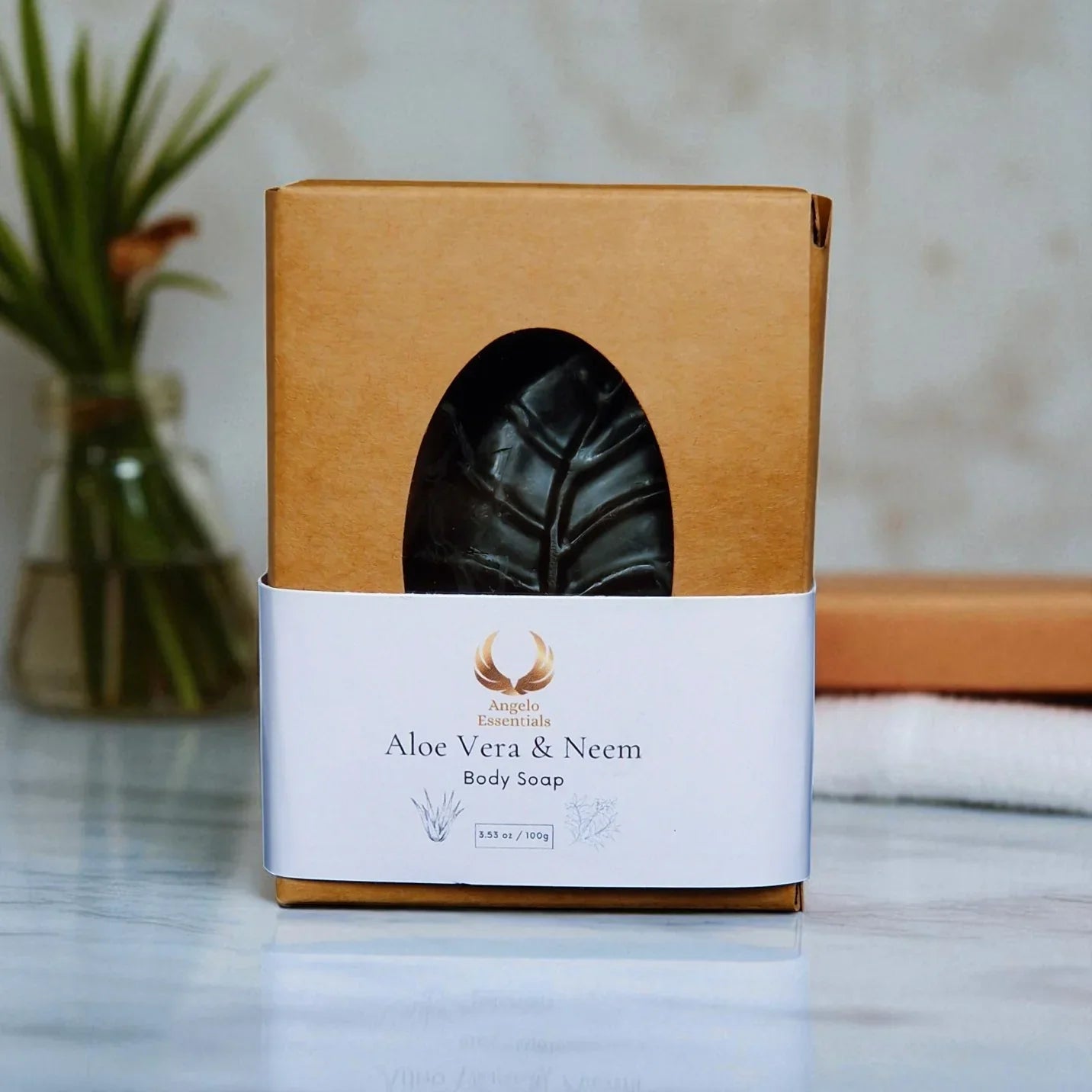 Aloe Vera & Neem Soap in eco-friendly packaging, showcasing its soothing and purifying benefits for skin care.